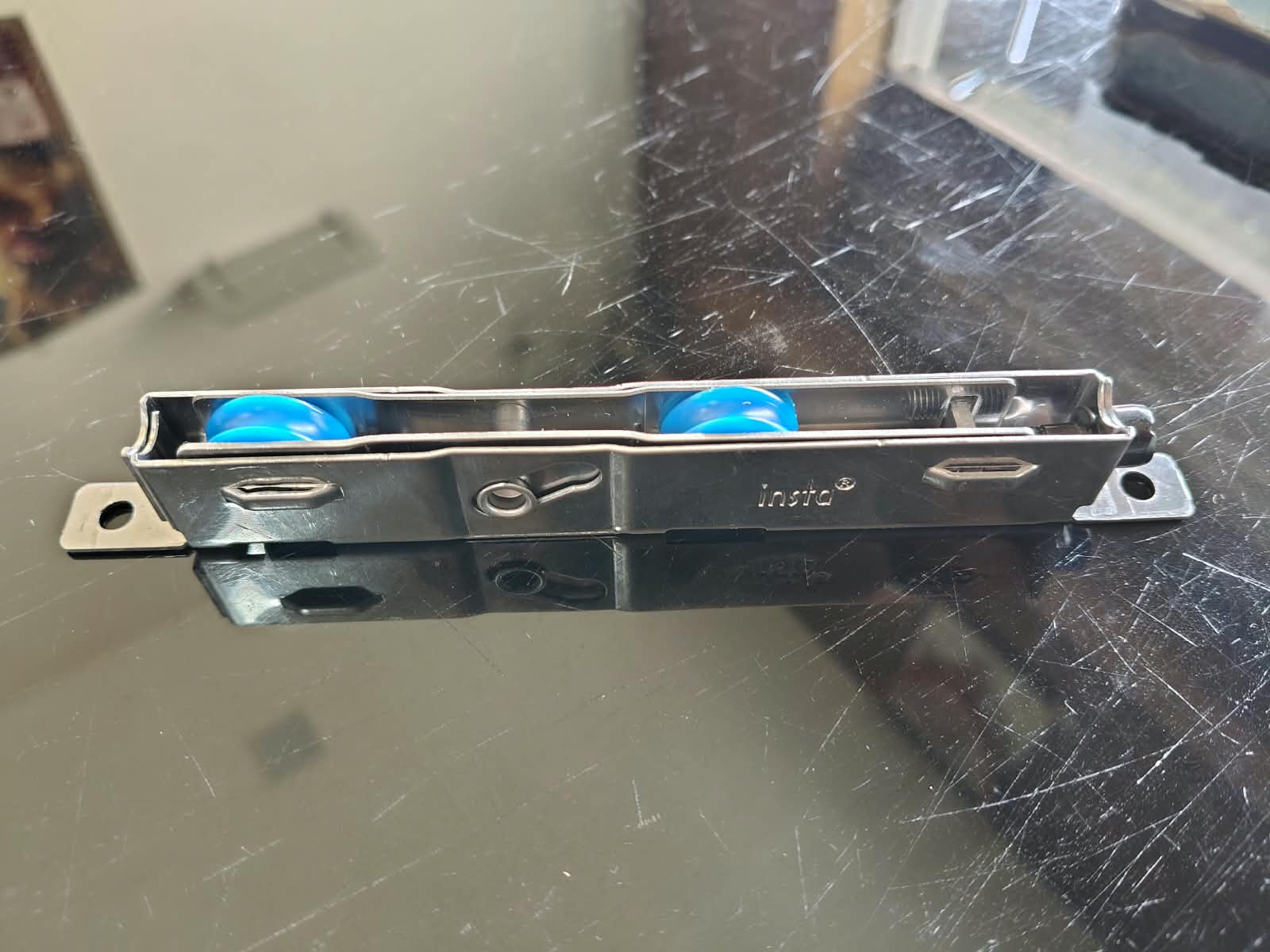 Sliding window roller assembly